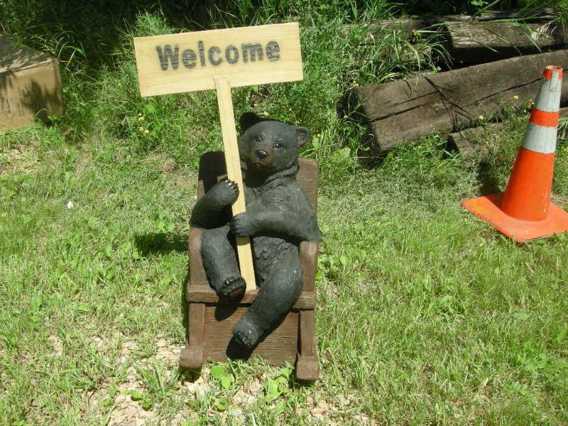 lot 36 image: Bear in Chair Welcome Figure