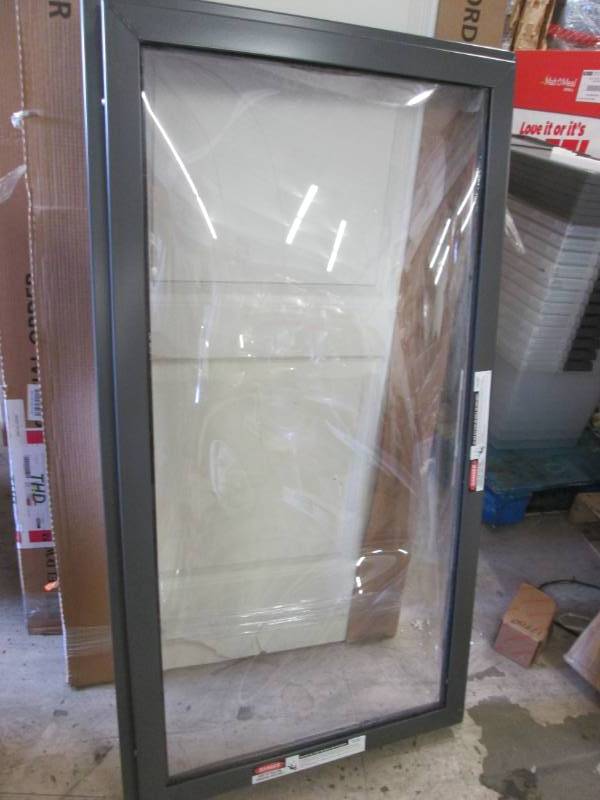 lot 95 image: Skylight 28x52 inches, outer lens d...