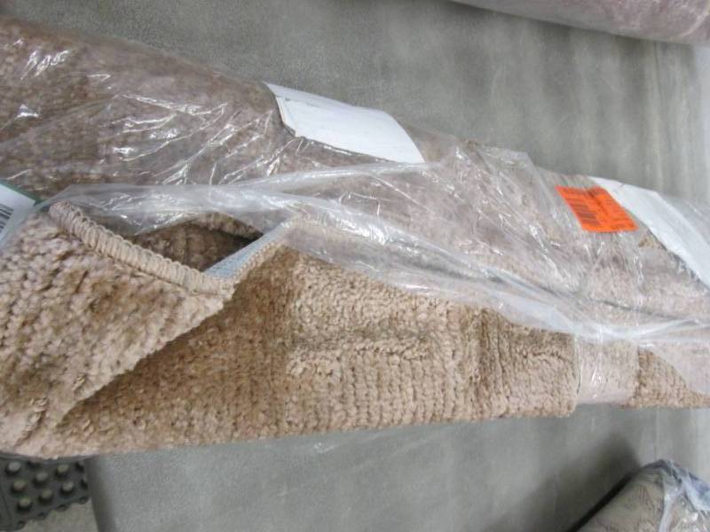 lot 212 image: Ottomanson Solid Design Beige 2 ft....