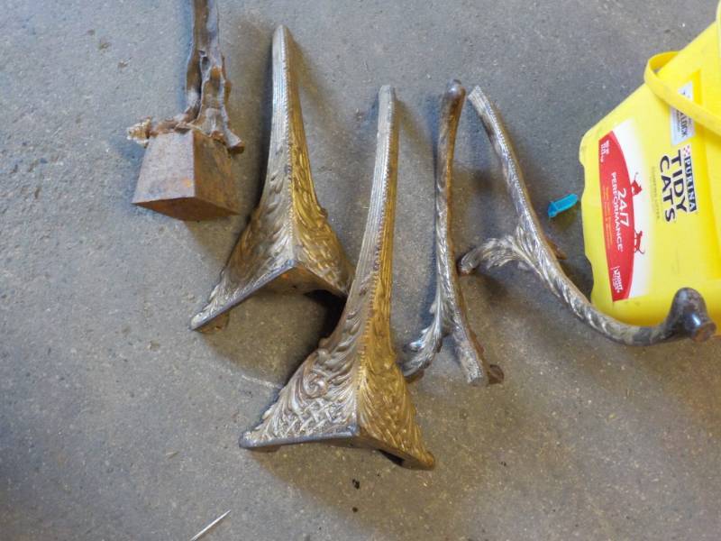 lot 44 image: Cast Iron Legs and Parts in a Pail...