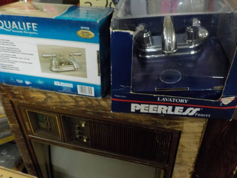 lot 133 image: Aqua Life and Peerless Faucets...