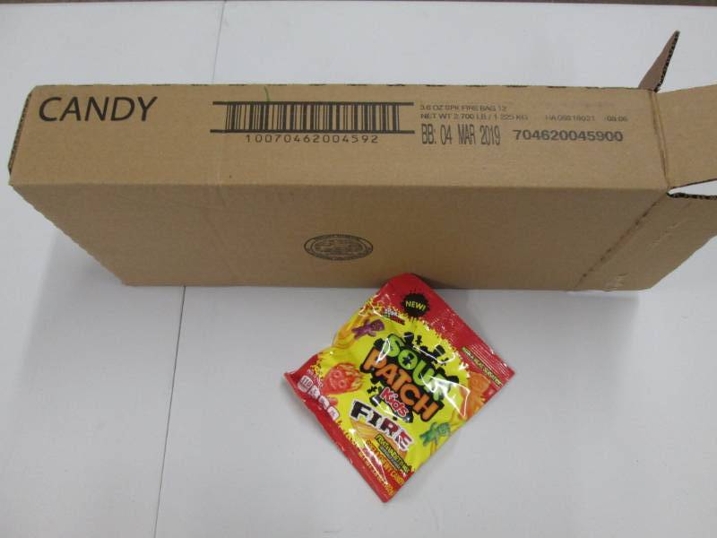 lot 208 image: Case of 12 Sour Patch Fire candy...