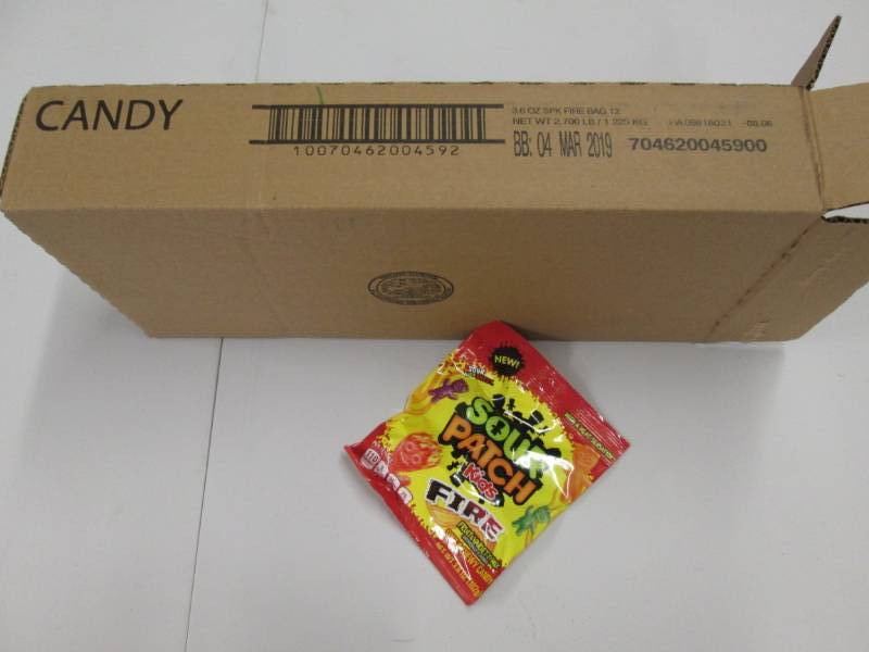 lot 209 image: Case of 12 Sour Patch Fire candy...