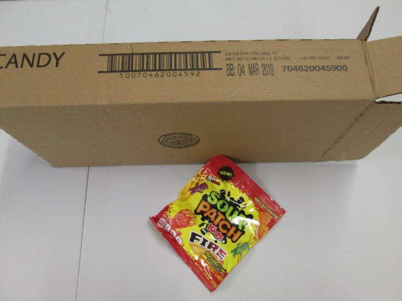 lot 211 image: Case of 12 Sour Patch Fire candy...