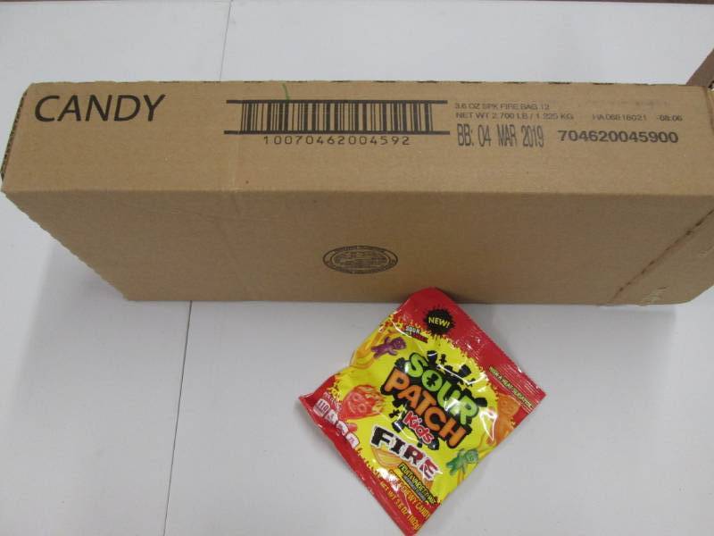 lot 212 image: Case of 12 Sour Patch Fire candy...