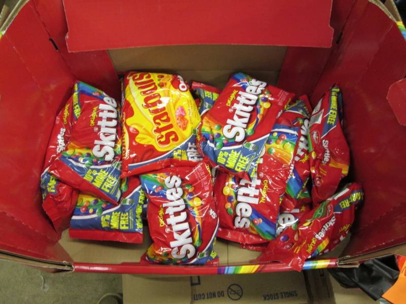lot 231 image: Lot of Skittles and Starburst candy...
