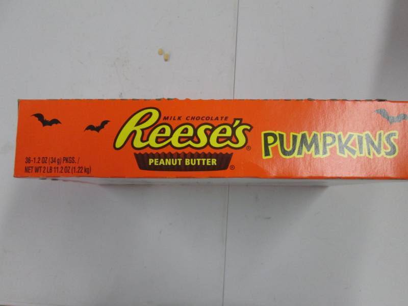 lot 299 image: Box of Reeses pumpkin peanut butter...
