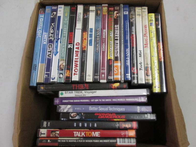 lot 311 image: Box of dvd movies...