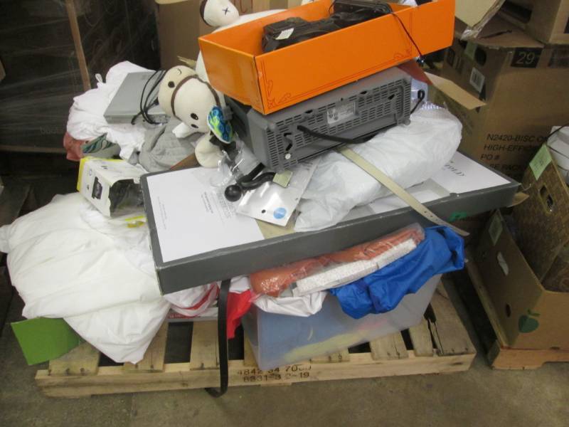 Pallet of UnclaimedUnsold  Items s...
