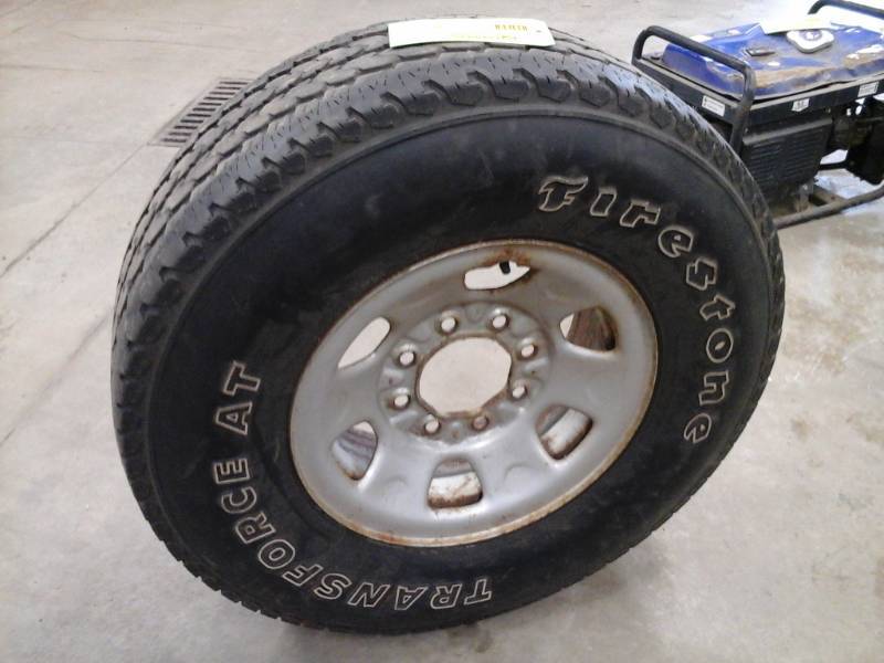 lot 22 image: Firestone Transforce AT LT26575R16 Light Truck Tire with 8-Lug Steel Wheel