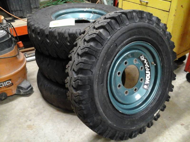 lot 24 image: Lot of (4) Skid Steer Snow Tires with Wheels