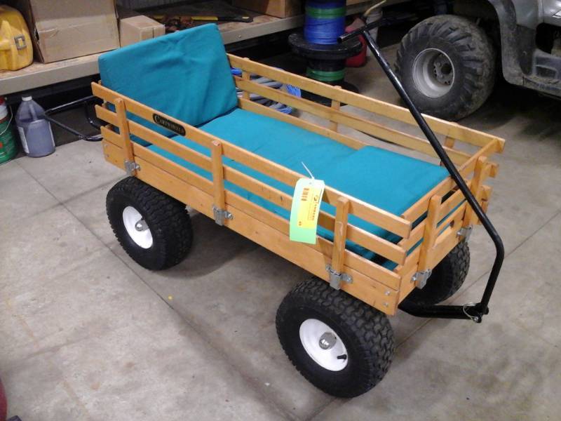 lot 49 image: Cartwheels Wood Stake Garden Cart