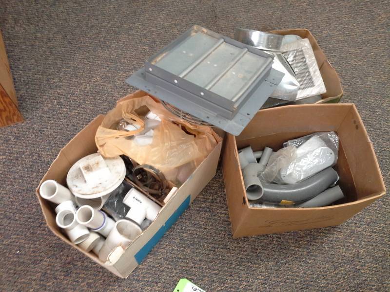 lot 30 image: Dayton 10in. Shutter Exhaust Fan 2CH19A, PVC Pipe Fittings, Various Metal Vent Covers