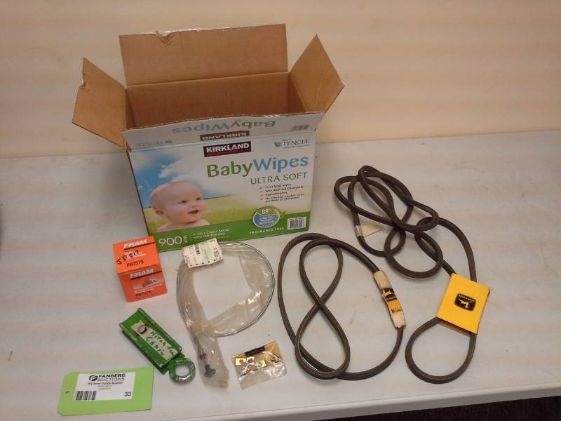 lot 33 image: John Deere Tractor Parts - Fan Belt M82258M44121M45998, Push Cable, Mounting Hardware, Eye Hook Hitch For Chain, FRAM Oil Filter 317 PH7575, Chains 212