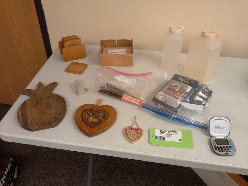 lot 59 image: Wood Pineapple Block, Wood Heart Wall Dcor, Plastic Bottles with Snap Lids, Coaster Set, Steak Knife, Calculator