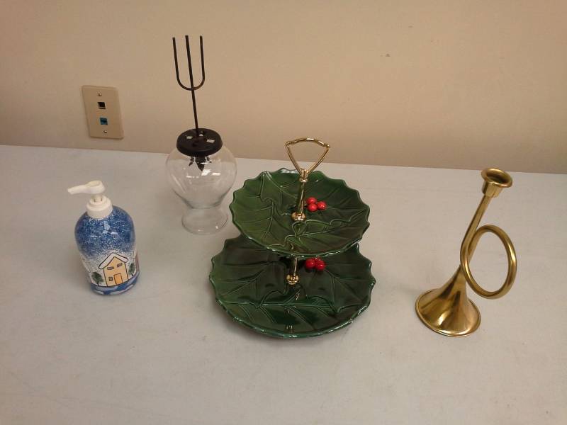 lot 76 image: 2-Tier Ceramic Serving Tray, Brass Horn Candleholder, Glass Vase with Pitch Fork, Ceramic Hand Soap Dispenser, Glass candle holder for centerpiece arrangement
