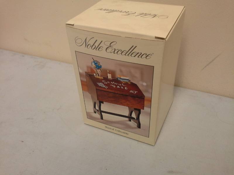 lot 86 image: Noble Excellence School Desk Musical Collectible Music Box
