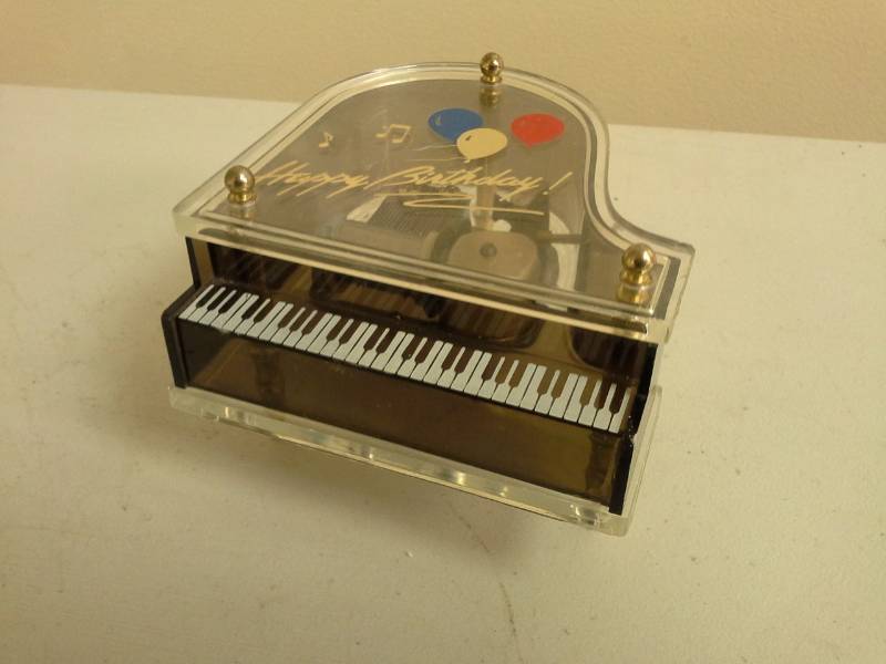 lot 100 image: Schmid Clear Case Grand Piano Music Box