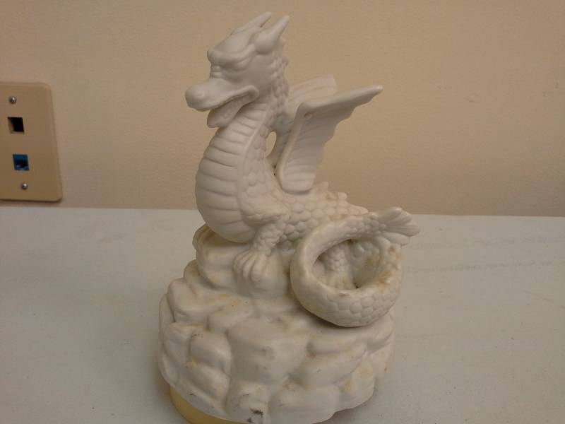 lot 102 image: Porcelain Dragon Music Box