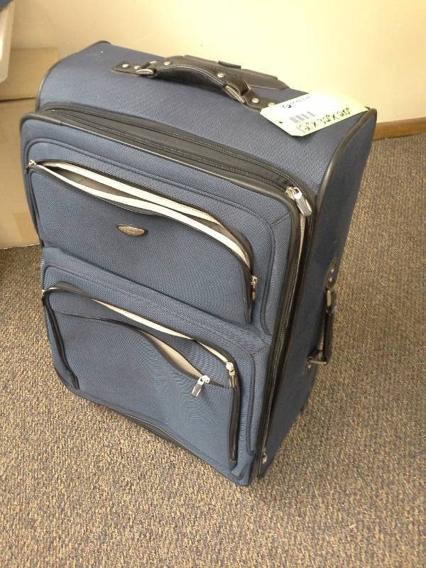 lot 133 image: Rolling Suitcase