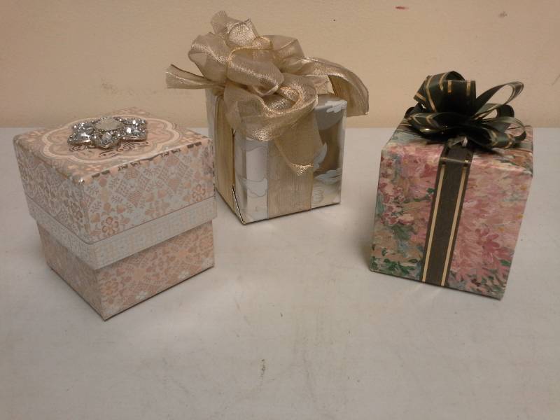 lot 148 image: Lot of (7) Musical Treasures Gift Box Music Boxes, Almond Soap
