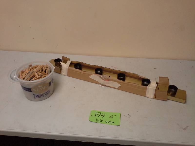 lot 194 image: 36in. 6-Lamp Bathroom Vanity Bar Light Fixture, Bucket of Wood Clothes Pins