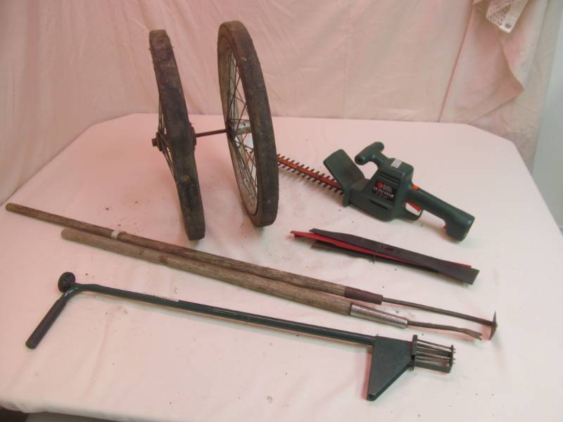 Bicycle wheels, garden tools, hedge trimmer