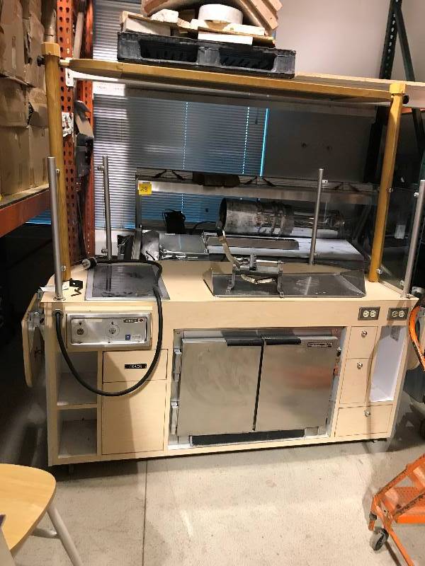 lot 26 image: Barker, laminate cooking demo cart, to adjustable mirror, NSF, Wells Mod #HC2256, cooktop, NSF, 208 volts, 1 or 3 ph, Beverage-Air Mod #UCR34, under counter 2 door refrigerator, NSF, 115v, 4.0a,  74x31x36H, 78oh