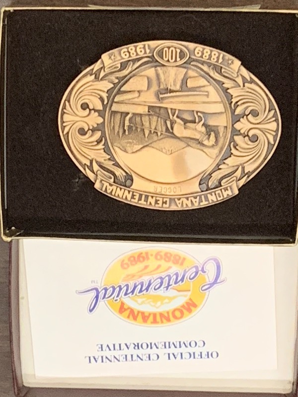 lot 17 image: (2) Collectible Belt Buckles