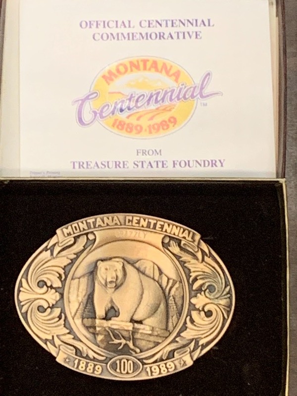 lot 22 image: (2) Collectible Belt Buckles