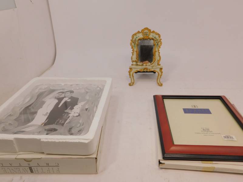lot 76 image: NIB Frames