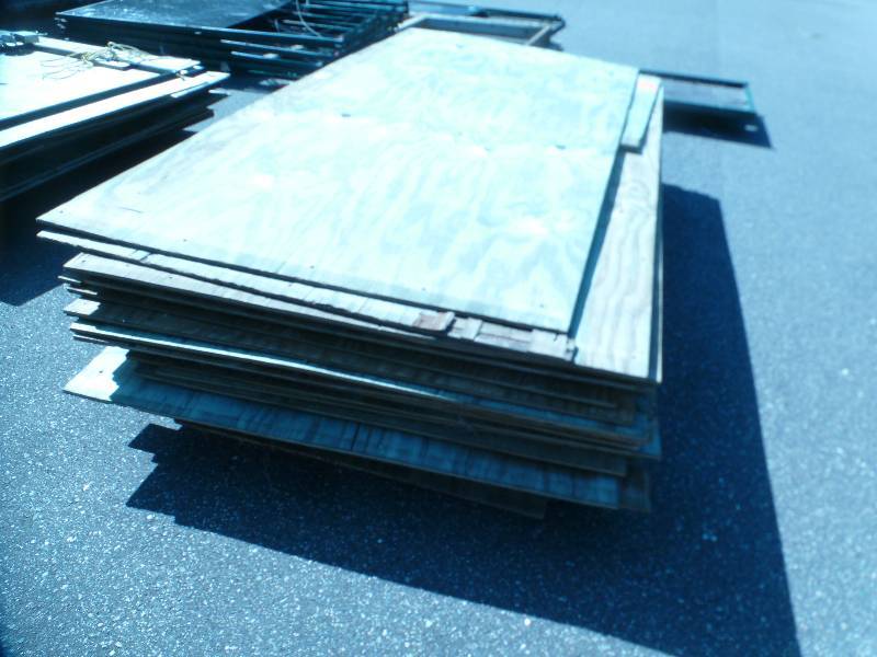 lot 38 image: Bundle of 30 Sheets of Treated Plywood 4x8x12