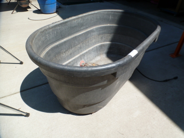 lot 58 image: 100 Gallon Heated Water Tank