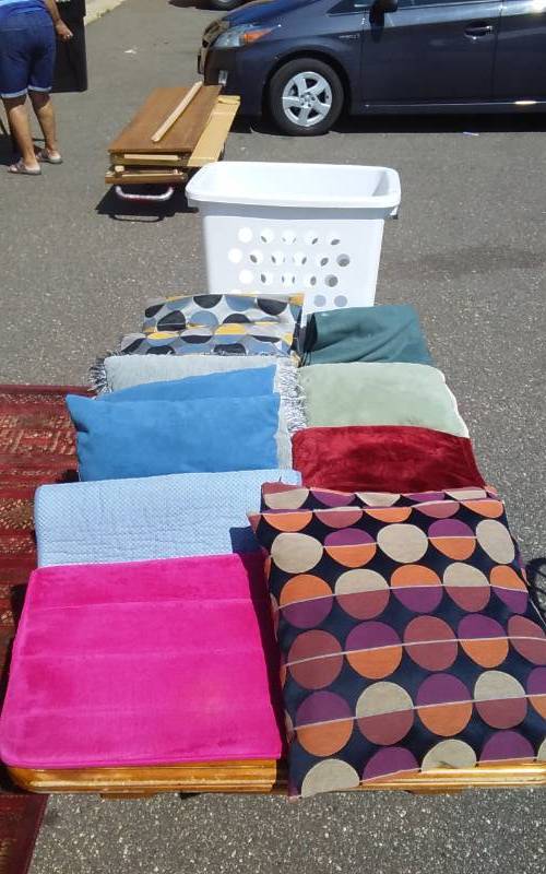 lot 22 image: Lot Of Decorative Pillows, Throw Blankets, Rugs Includes Hamper
