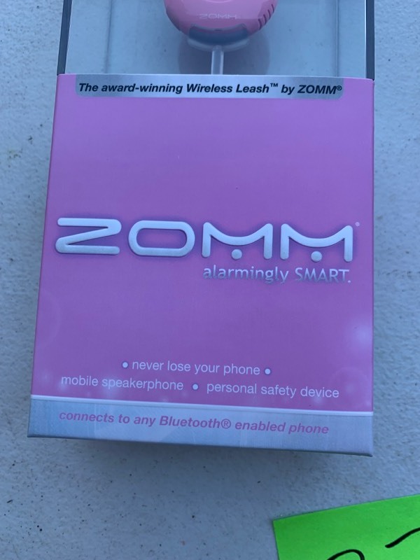 lot 27 image: ZOMM Wireless Leash for Phone w BlueTooth Capabilities- Pink