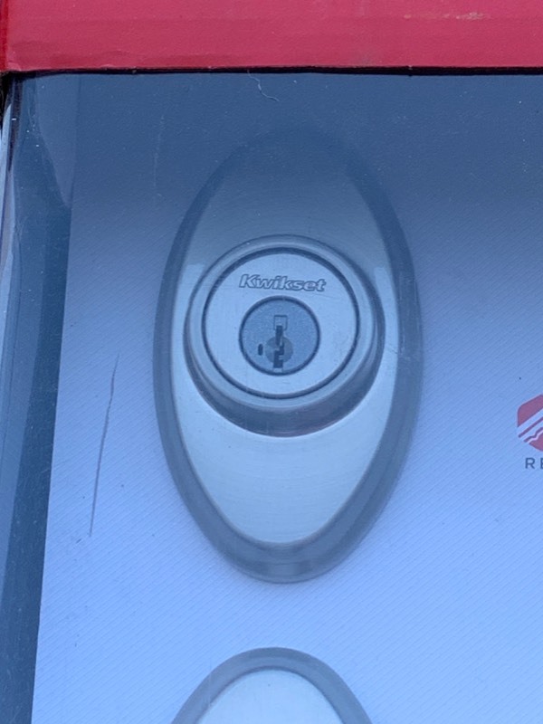 lot 31 image: Kwikset SmartKey Technology, Satin Nickel Front Entry Door Lock