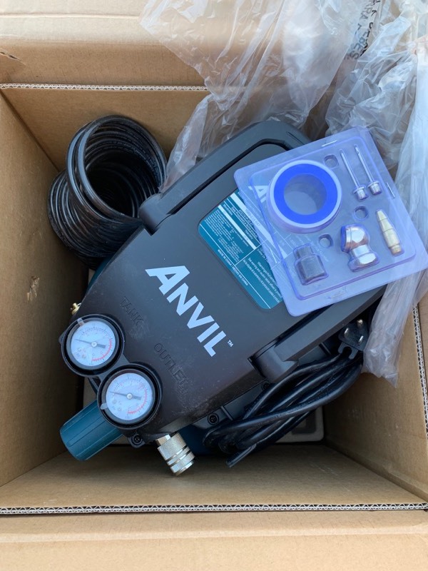 lot 38 image: Anvil 2 gallon Pancake Air Compressor and Accessory Kit