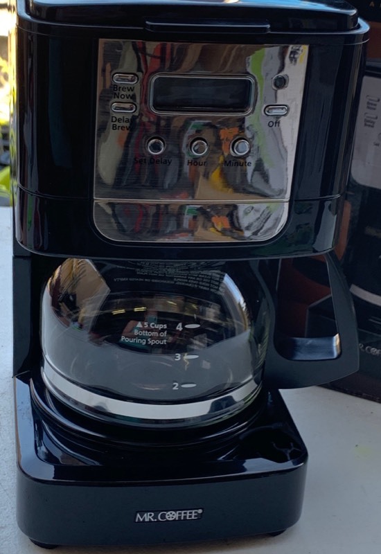 lot 77 image: Mr. Coffee 5 Cup Programmable, 1-Hour Auto shut off small piece on bottom cracked