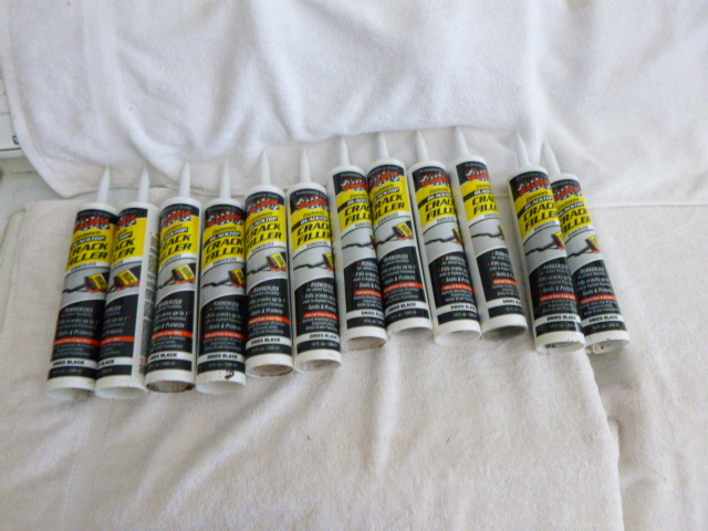 lot 15 image: 12 Tubes of Elastomeric Blacktop Crack Filler