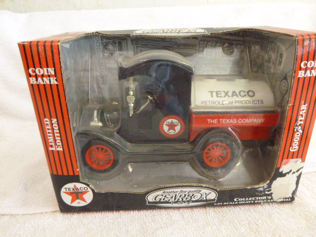 lot 74 image: Gearbox 1912 Ford Oil Tanker Texaco Coin Ban