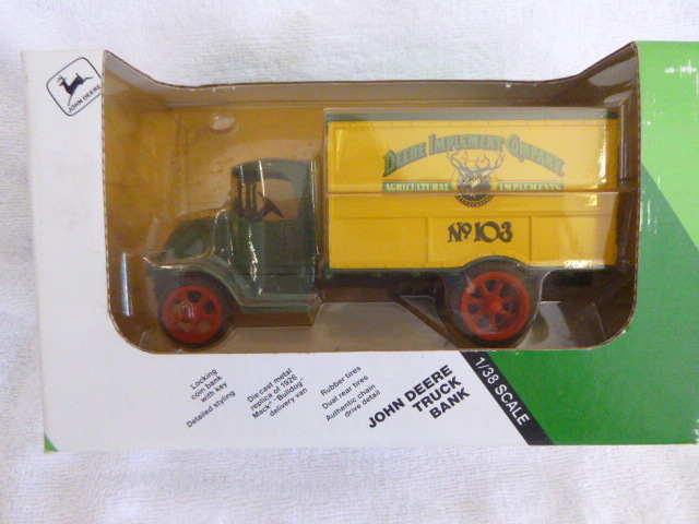 lot 77 image: Ertl John Deere Truck Bank Implement Company