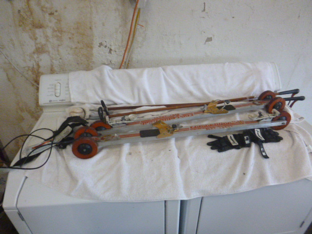 lot 138 image: Roller Skis and Baseball Practice Set