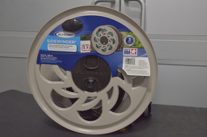 lot 13 image: Suncast 125 ft. Side Tracker Wall Mount Hose Reel
