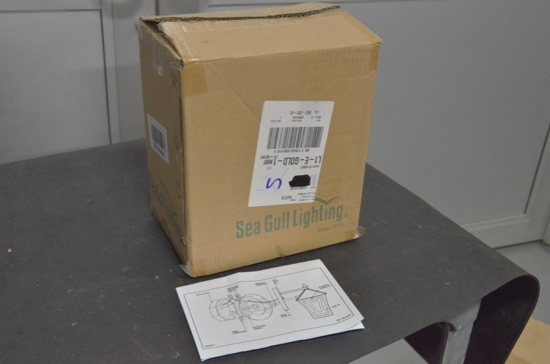 lot 28 image: Sea Gull Lighting Herrington 1-Light Black Outdoor Wall Lantern Sconce