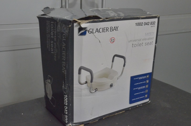 lot 32 image: Glacier Bay 1-Piece Adjustable Elevated Toilet Seat in White Color