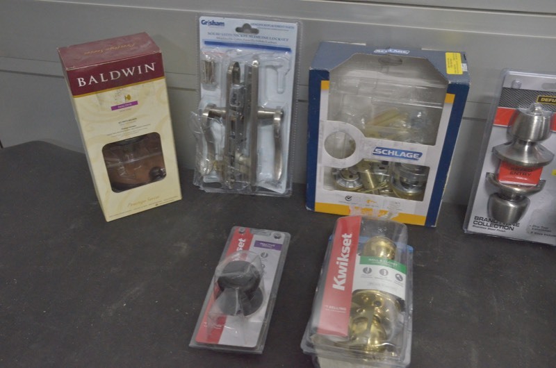 lot 64 image: Lot of Schlage, Baldwin, Grisham Door knobs and handles