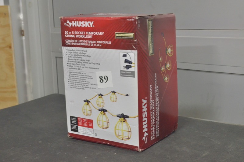 lot 89 image: Husky 50 ft. 5-Bulb String Caged Work Lights