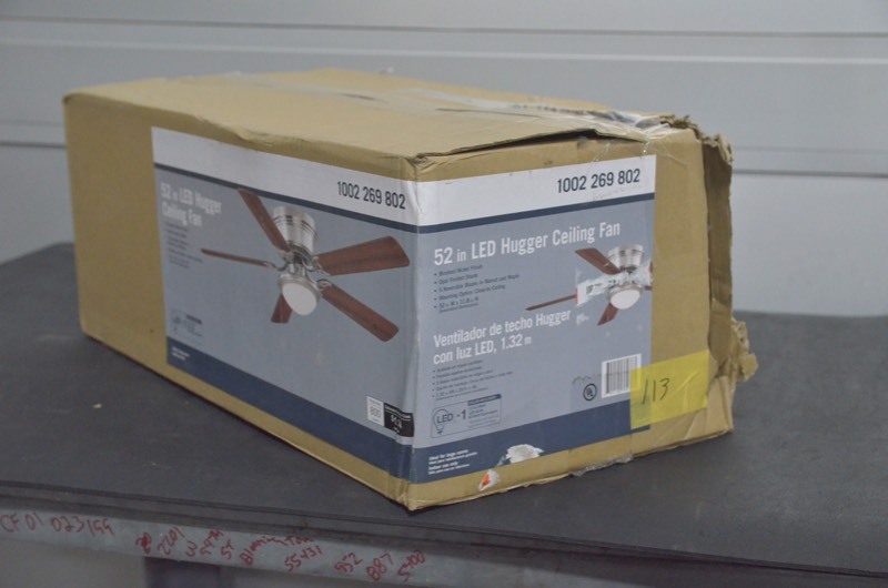 lot 113 image: Hugger 52 in. LED Indoor Brushed Nickel Ceiling Fan with Light Kit with slight box damage.