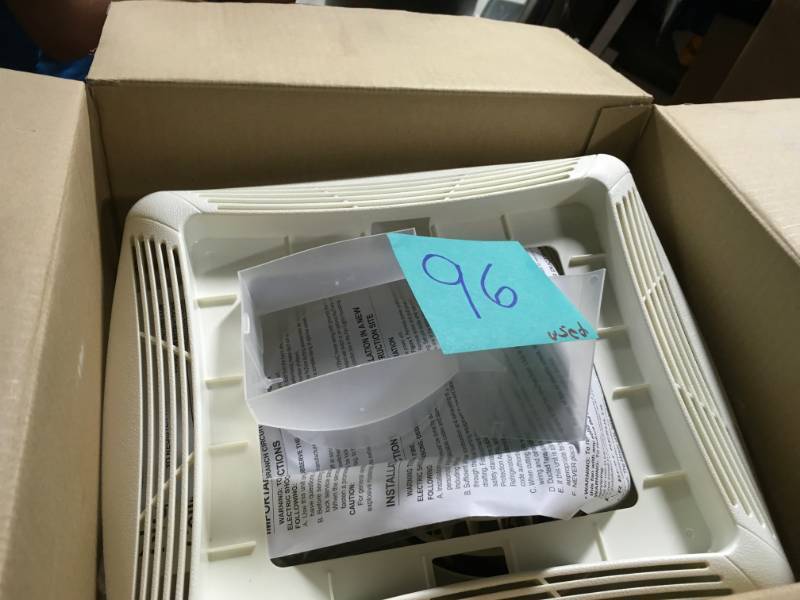 lot 96 image: NuTone 70 CFM Ceiling Bathroom Exhaust Fan with Light, White Grille and Light in good condition