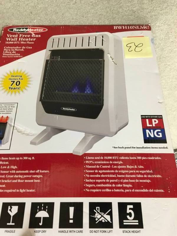 lot 23 image: Reddy Heater 10,000 BTU Blue Flame Dual-Fuel Wall Heater  in good condition